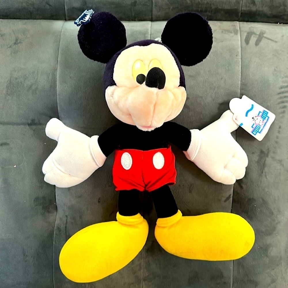 Vintage Mickey Mouse plush by applause with all original tags